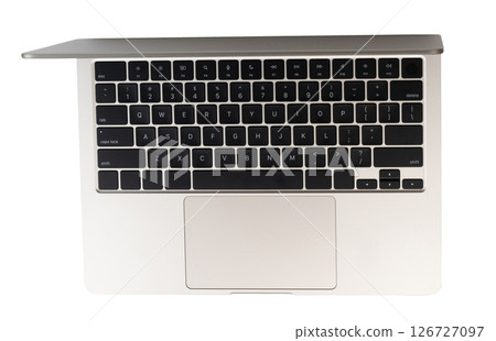Black keyboard key on open laptop 126727097