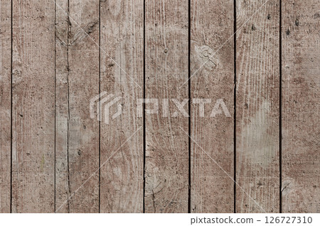 A collection of weathered wooden planks showcases a rustic texture and natural aging. These planks are ideal for home decor, craft projects, and design inspirations at any time A collection of weathered wooden planks showcases a rustic texture and natural aging. These planks are ideal for home decor, craft projects, and design inspirations at any time 126727310