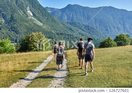 People hiking in the Alps, summer mountain landscape 126727681