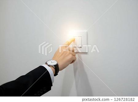Hand Turning On Light Switch, Business Concept 126728182