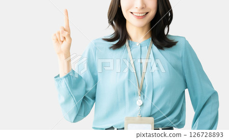 A woman/businesswoman pointing with her index finger up A woman/businesswoman pointing with her index finger up 126728893