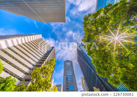 Tokyo cityscape in Japan. Otemachi with fresh greenery. View of Otemachi Place and Urbannet Otemachi Building on the 28th. Tokyo cityscape in Japan. Otemachi with fresh greenery. View of Otemachi Place and Urbannet Otemachi Building on the 28th. 126730061