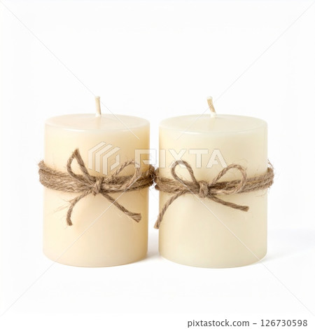 Pair of Cream-Colored Pillar Candles with Jute Twine Bows 126730598
