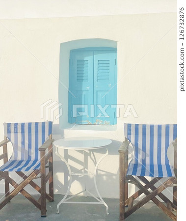Outdoor furniture in Greek style and blue shutters on the window Outdoor furniture in Greek style and blue shutters on the window 126732876