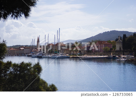 Makarska, a coastal gem on the Adriatic Sea . Crystalline waters and charming paths. 126733065