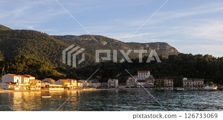 Peaceful sunset at Ston, Croatia . Relax at the Croatian beach Peaceful sunset at Ston, Croatia . Relax at the Croatian beach 126733069