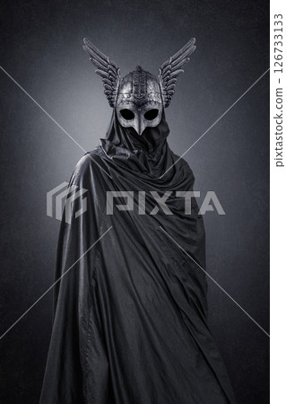 Warrior spirit with winged helmet over dark misty background 126733133