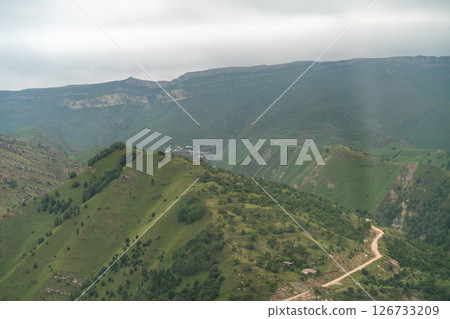 Caucasian mountain. Dagestan. Trees, rocks, mountains, view of the green mountains. Beautiful summer landscape. Caucasian mountain. Dagestan. Trees, rocks, mountains, view of the green mountains. Beautiful summer landscape. 126733209