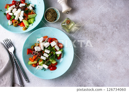 Greek salad with vegetables, olives and feta cheese Greek salad with vegetables, olives and feta cheese 126734060