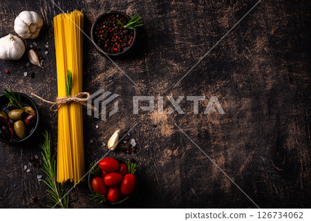 Italian food background with spaghetti, tomato and spices 126734062