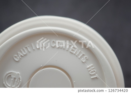 Cup base with caution warning about hot contents Cup base with caution warning about hot contents 126734420