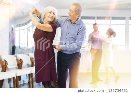 Elderly man and elderly woman dance waltz Elderly man and elderly woman dance waltz 126734461