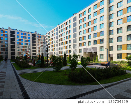 A Modern Urban Residential Complex Designed with Beautiful Green Landscaping Features A Modern Urban Residential Complex Designed with Beautiful Green Landscaping Features 126734539