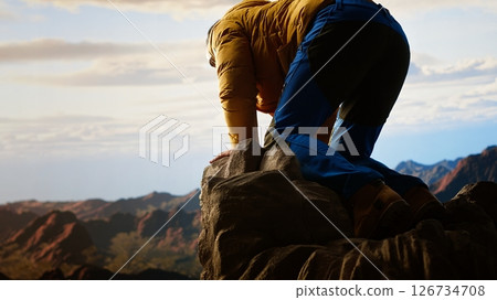 Careless climber distracted by his smartphone is tumbling on a mountain top, unequipped clumsy traveler dropping his phone due to his obsession with staying online. Foolish hike. Camera B. 126734708