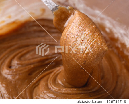 Creamy Gingerbread Dough Being Mixed with Spoon Close-Up 126734748