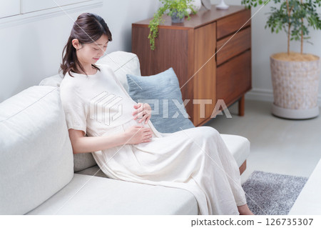 Young pregnant woman Young pregnant woman 126735307