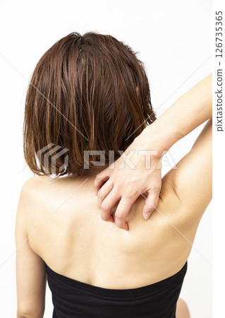 Woman suffering from back pain 126735365