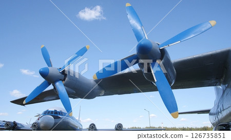 Historic Aircraft With Blue Propellers on Display Under Clear Sky at Aviation Museum During Sunny Afternoon 126735851