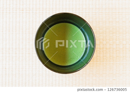 A bowl filled with matcha tea A bowl filled with matcha tea 126736005