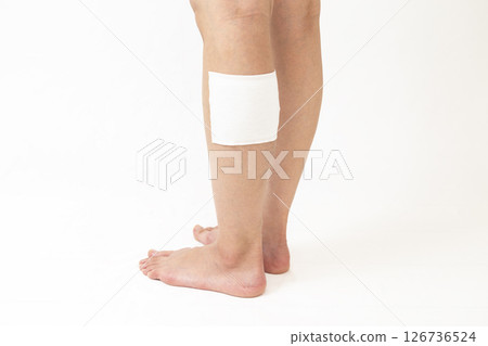 Woman's leg with a compress 126736524