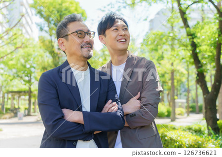 Portrait of a middle-aged man standing in a residential area Portrait of a middle-aged man standing in a residential area 126736621