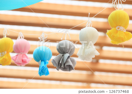 Many Teru Teru Bouzu dolls hanging 126737468