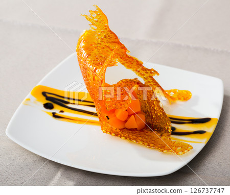 Pumpkin in caramel lace dessert 126737747