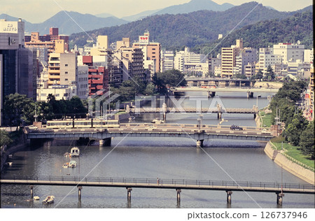 A bridge over the Kyobashi River in Hiroshima. Tram on the Inari Ohashi Bridge (1992) A bridge over the Kyobashi River in Hiroshima. Tram on the Inari Ohashi Bridge (1992) 126737946