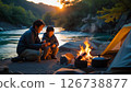 A family camping by the river 126738877