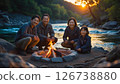 A family camping by the river 126738880