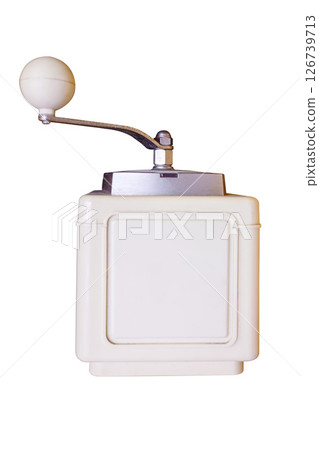 Vintage hand cranked coffee grinder isolated on white background Vintage hand cranked coffee grinder isolated on white background 126739713