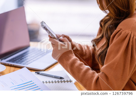 Hand of  young woman used smartphone in the office. 126739796