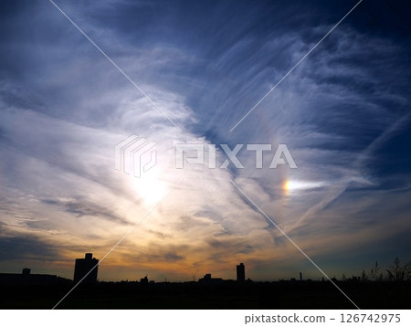 Halo and sun dog appearing in the evening sky of Kawaguchi City 126742975
