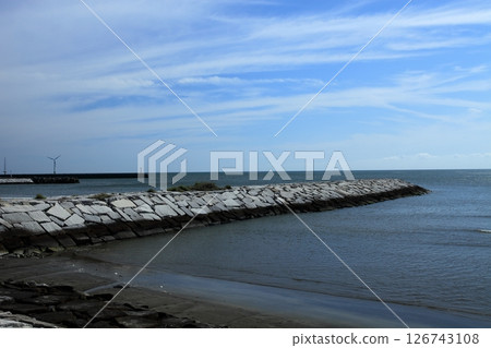A seawall paved with large stones 126743108