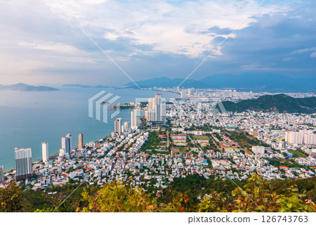Panorama of Nha Trang city in Vietnam. Panoramic top view of Nha Trang town Panorama of Nha Trang city in Vietnam. Panoramic top view of Nha Trang town 126743763