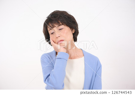 Senior woman suffering from toothache 126744543