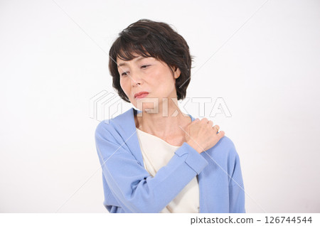 Senior woman suffering from shoulder pain Senior woman suffering from shoulder pain 126744544