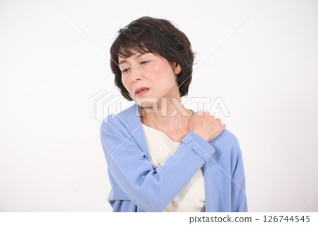 Senior woman suffering from shoulder pain 126744545