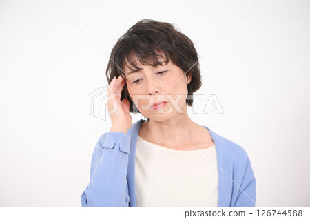 Senior woman suffering from headache 126744588