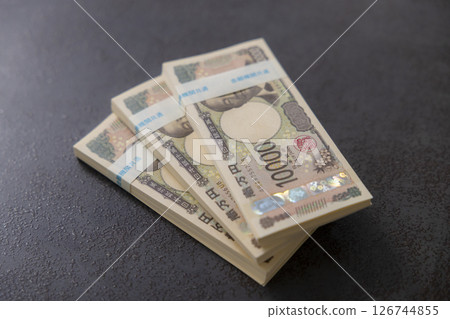 A stack of new banknotes A stack of new banknotes 126744855