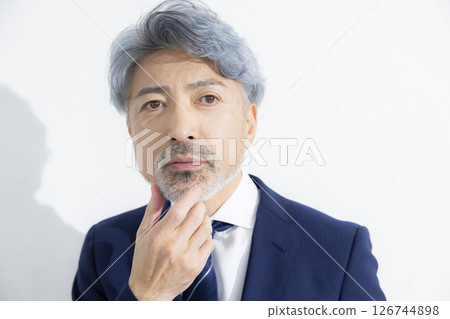 A cool guy in a suit A cool guy in a suit 126744898