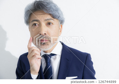A cool guy in a suit A cool guy in a suit 126744899