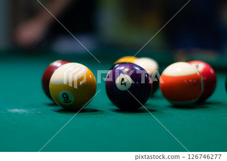 Close up background image of billiard balls on green table in pool club copy space 126746277
