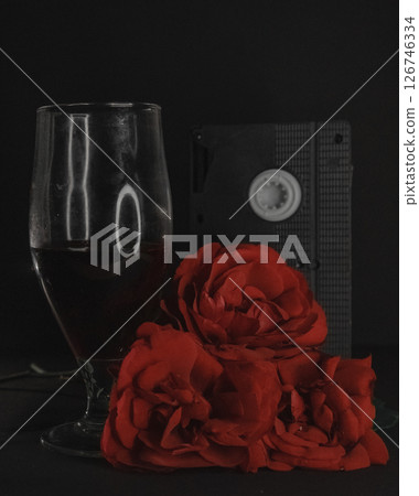 red rose and glass of champagne red rose and glass of champagne 126746334