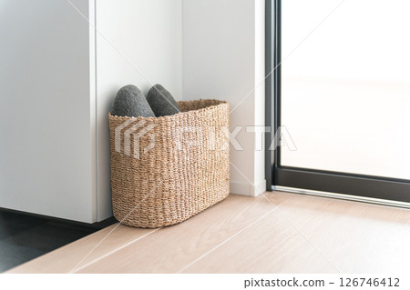 Slipper basket at the entrance 126746412