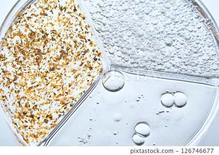 Three different serums in a three-section petri dish. Three different serums in a three-section petri dish. 126746677