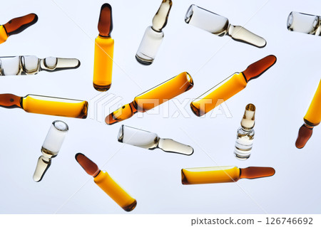 Various ampoules with drugs. View from below. 126746692