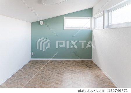 Attic room with a sloping roof 126746771