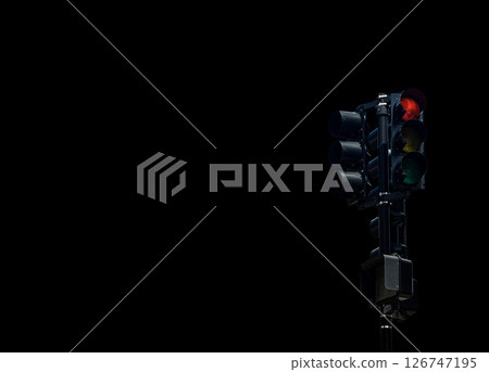 Red Traffic Light Against Black Background Red Traffic Light Against Black Background 126747195