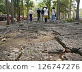 Walking the stone pavement of Southeast Asian ruins 126747276